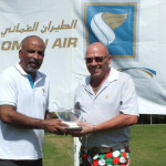 Martin Miller, Nett Runner-Up receiving his trophy and prize from Gihan Karunaratne, Country Manager for Sri Lanka and Maldives, Oman Air 