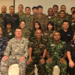 CICRA Director/CEO Boshan Dayaratne (Right) and Master Trainer Krishnan Rajagopal  (Left) with a group of top military officers representing member nations of the Multinational Communications Interoperability Program at the Cyber Endeavor Program in Thailand.