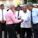 Ranatunga, Chairman of Mihin Lanka, greets Hon. A.H.M Fowzie, Minister of Urban Affairs. 